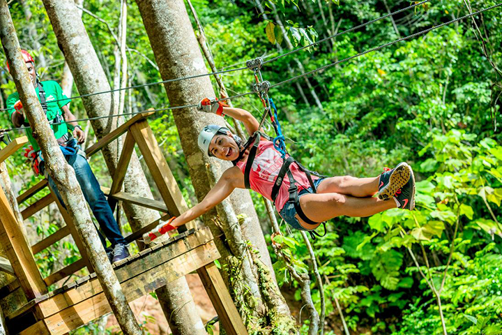 zip lining in the forest